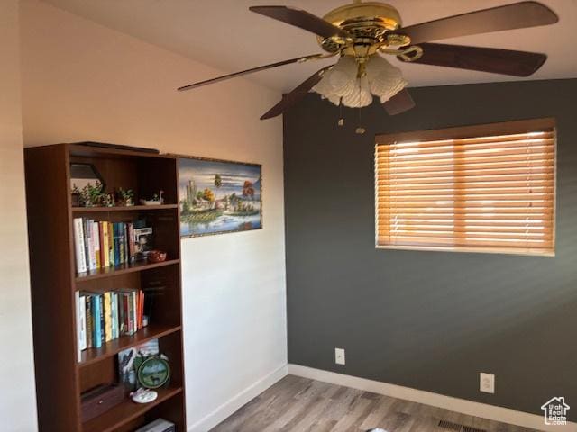 495 E 34 S Unit 10, Orem, UT 84097 - spare room featuring a ceiling fan, wood finished floors, and baseboards