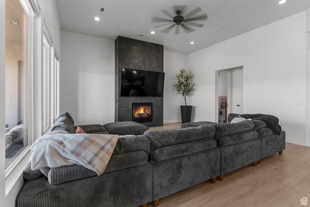 423 W Fitness Way, Ivins, UT 84738 - living room featuring light wood finished floors, ceiling fan, a fireplace, recessed lighting, and baseboards