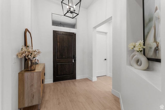 423 W Fitness Way, Ivins, UT 84738 - entryway featuring a chandelier, light wood-style flooring, and baseboards