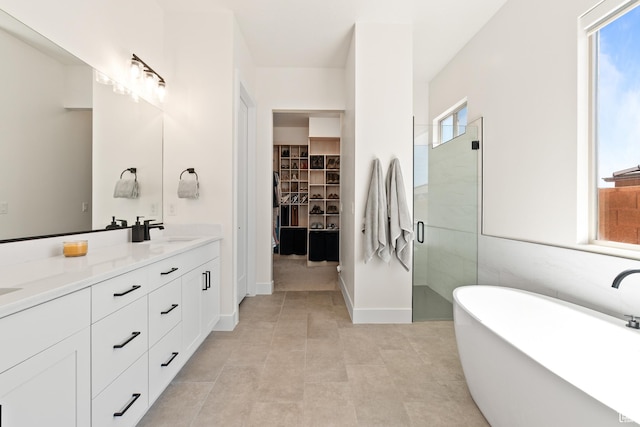423 W Fitness Way, Ivins, UT 84738 - full bathroom featuring double vanity, a shower stall, a soaking tub, and healthy amount of natural light