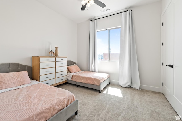 423 W Fitness Way, Ivins, UT 84738 - carpeted bedroom with a ceiling fan and baseboards