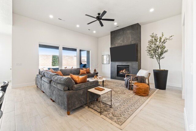 423 W Fitness Way, Ivins, UT 84738 - living area with a fireplace, recessed lighting, light wood-style floors, and ceiling fan