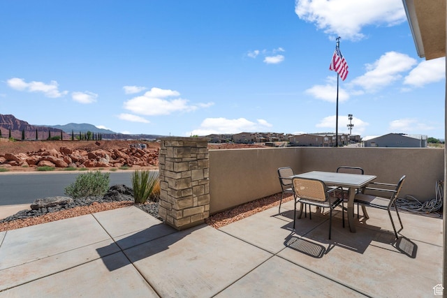 423 W Fitness Way, Ivins, UT 84738 - view of patio / terrace with a mountain view and outdoor dining area
