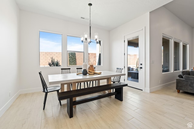 423 W Fitness Way, Ivins, UT 84738 - dining room with a chandelier and light wood finished floors