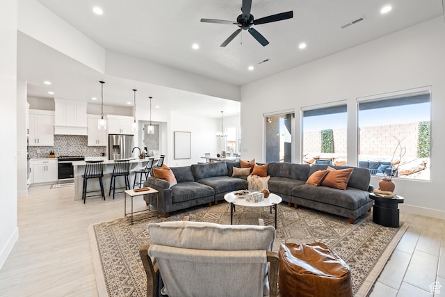 423 W Fitness Way, Ivins, UT 84738 - living room featuring healthy amount of natural light, recessed lighting, and ceiling fan