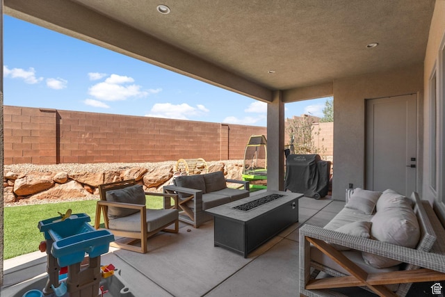 423 W Fitness Way, Ivins, UT 84738 - view of patio featuring an outdoor living space with a fire pit and grilling area