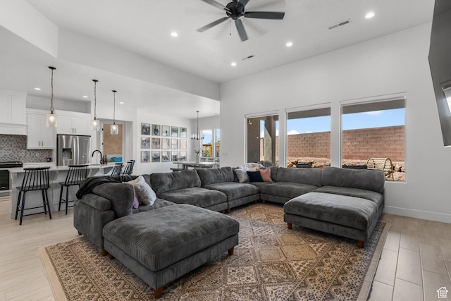 423 W Fitness Way, Ivins, UT 84738 - living room with ceiling fan, recessed lighting, and light wood-type flooring