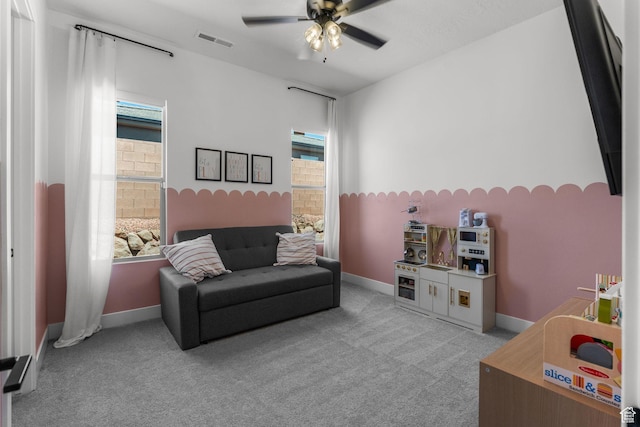 423 W Fitness Way, Ivins, UT 84738 - carpeted living area with ceiling fan and baseboards