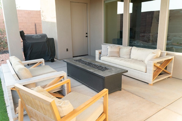 423 W Fitness Way, Ivins, UT 84738 - view of patio featuring grilling area and an outdoor living space with a fire pit