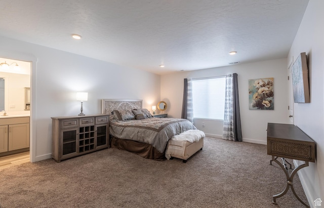 634 W Parker Pl Unit 1060, Grantsville, UT 84029 - bedroom with light carpet, ensuite bathroom, baseboards, and recessed lighting