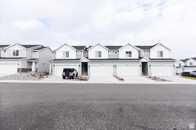 634 W Parker Pl Unit 1060, Grantsville, UT 84029 - townhome / multi-family property with a residential view and a garage