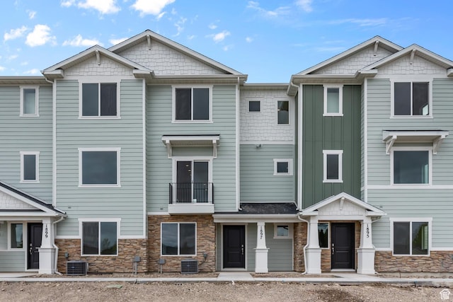 1885 E Thunder Ln Unit 495, Eagle Mountain, UT 84005 - multi unit property with stone siding, central AC, and board and batten siding