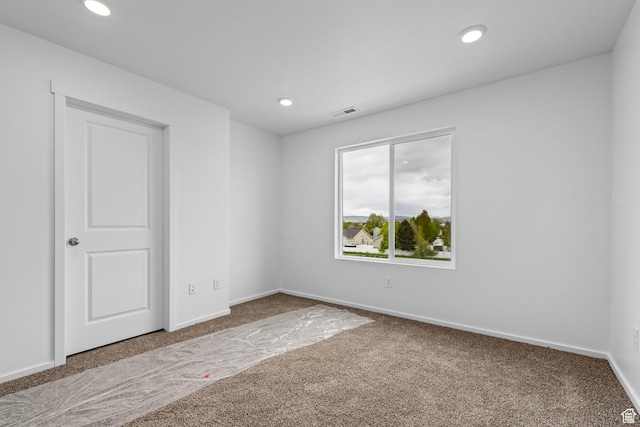 1885 E Thunder Ln Unit 495, Eagle Mountain, UT 84005 - spare room with carpet flooring, recessed lighting, and baseboards