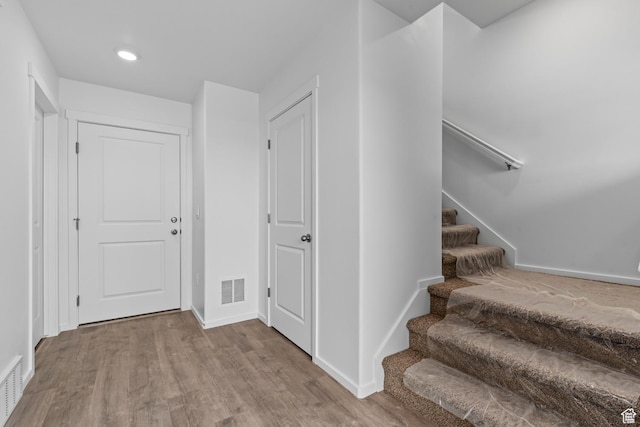 1885 E Thunder Ln Unit 495, Eagle Mountain, UT 84005 - entryway featuring wood finished floors, stairs, baseboards, and recessed lighting