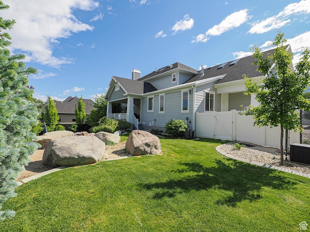 13772 S Kennington Ct E, Draper, UT 84020 - back of house with a gate, roof with shingles, a chimney, and central AC unit