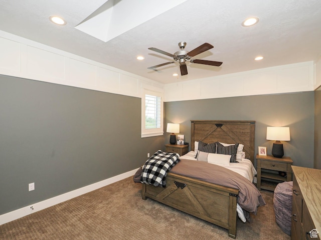 13772 S Kennington Ct E, Draper, UT 84020 - bedroom with carpet floors, recessed lighting, a skylight, a ceiling fan, and baseboards