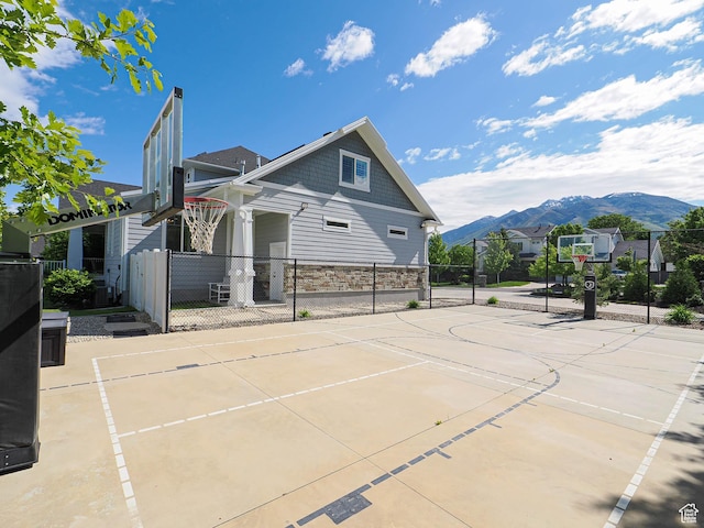 13772 S Kennington Ct E, Draper, UT 84020 - view of basketball court with basketball hoop and a mountain view