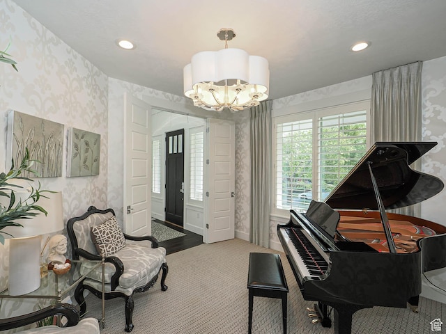13772 S Kennington Ct E, Draper, UT 84020 - living area featuring wallpapered walls, carpet flooring, a chandelier, baseboards, and recessed lighting