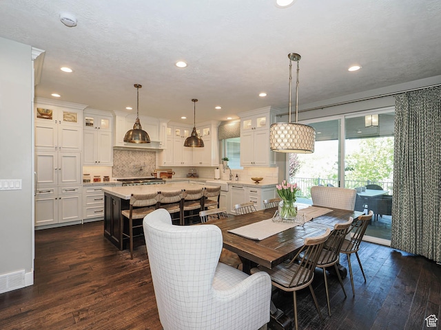 13772 S Kennington Ct E, Draper, UT 84020 - dining space with dark wood-style floors and recessed lighting