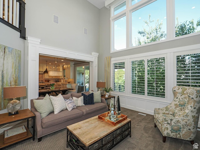 13772 S Kennington Ct E, Draper, UT 84020 - carpeted living room featuring a high ceiling