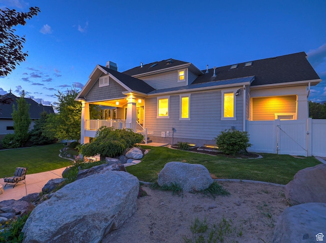 13772 S Kennington Ct E, Draper, UT 84020 - back of property with a gate, a chimney, and a patio