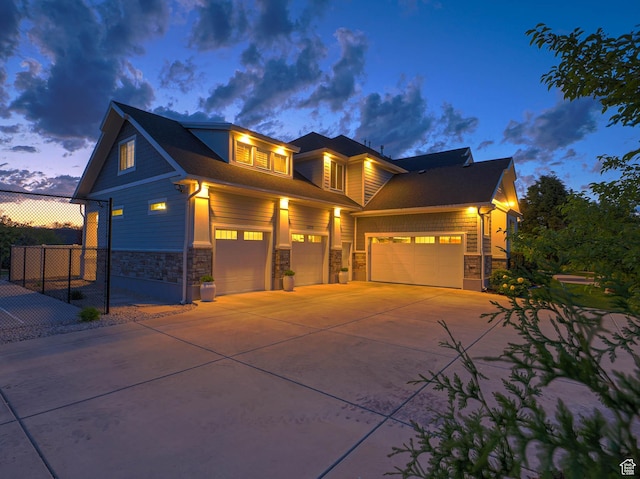 13772 S Kennington Ct E, Draper, UT 84020 - view of front of home featuring stone siding and concrete driveway