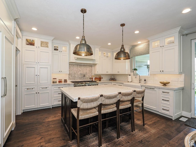 13772 S Kennington Ct E, Draper, UT 84020 - kitchen with white cabinetry, dark wood finished floors, backsplash, and recessed lighting