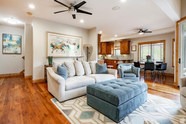 3006 E Canyon Links Dr S, Park City, UT 84098 - living room with a ceiling fan, light wood finished floors, baseboards, and recessed lighting