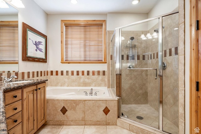 3006 E Canyon Links Dr S, Park City, UT 84098 - bathroom featuring vanity, a bath, a stall shower, tile patterned floors, and recessed lighting