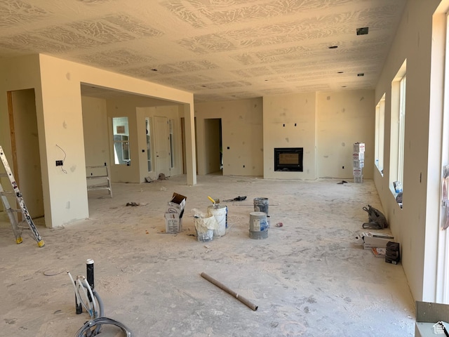 1585 E Black Brush Dr Unit 61, Washington, UT 84780 - unfurnished living room with a fireplace