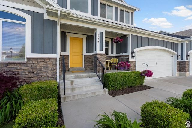 277 N 3600 W, Layton, UT 84041 - doorway to property with stone siding and board and batten siding