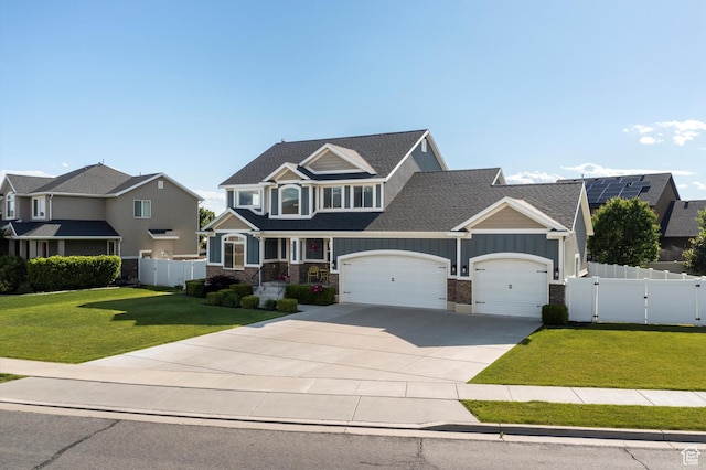 277 N 3600 W, Layton, UT 84041 - craftsman-style home with an attached garage, driveway, a gate, and stone siding
