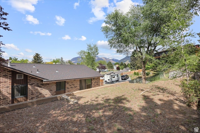 1694 E Plata Way, Sandy, UT 84093 - view of yard with a mountain view