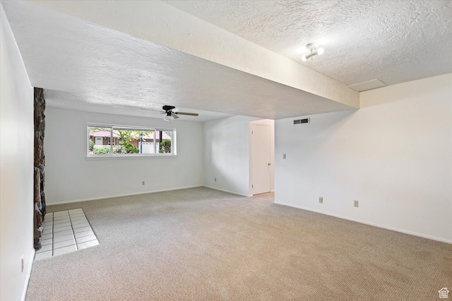 1694 E Plata Way, Sandy, UT 84093 - spare room featuring light carpet, a textured ceiling, baseboards, and a ceiling fan