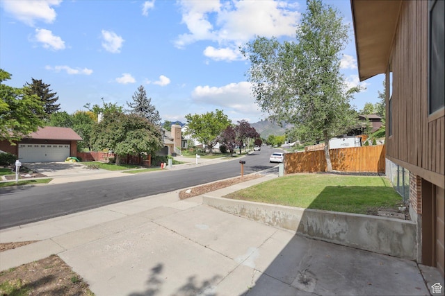 1694 E Plata Way, Sandy, UT 84093 - view of asphalt street with sidewalks and a residential view