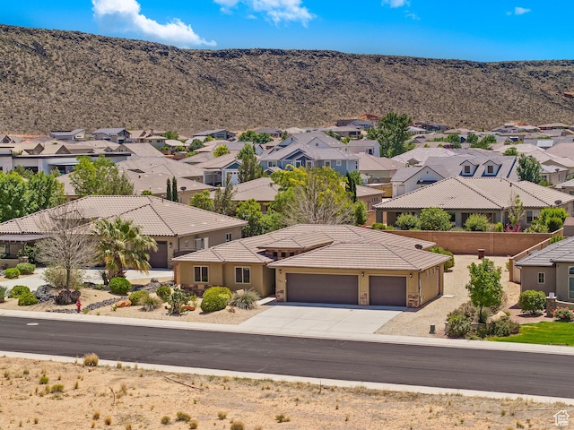 3345 W 2430 S, Hurricane, UT 84737 - aerial perspective of suburban area with a mountainous background