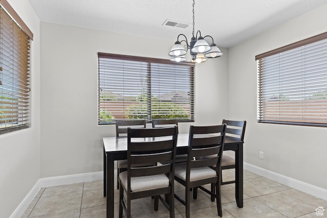 3345 W 2430 S, Hurricane, UT 84737 - dining room with a chandelier, plenty of natural light, and light tile patterned floors