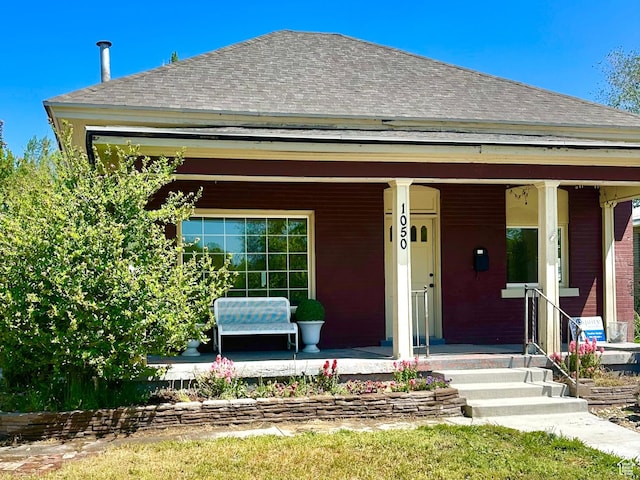 1050 W 100 N, Provo, UT 84601 - view of front of house featuring covered porch and roof with shingles