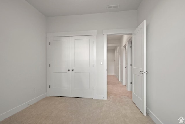 11433 S Watercourse Rd Unit 184, South Jordan, UT 84009 - unfurnished bedroom with light carpet, baseboards, and a closet