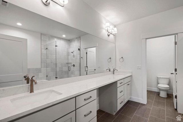 11433 S Watercourse Rd Unit 184, South Jordan, UT 84009 - full bath with double vanity, a stall shower, toilet, baseboards, and recessed lighting