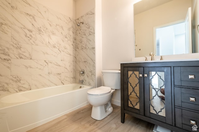 10227 S Oquirrh Lake Rd, South Jordan, UT 84095 - full bath with wood finished floors, toilet, vanity, and shower / tub combination