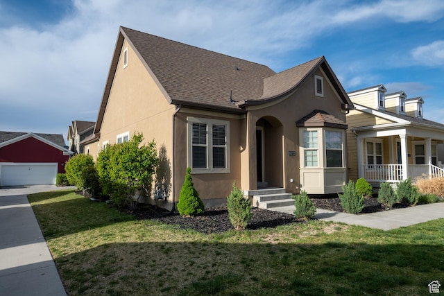 10227 S Oquirrh Lake Rd, South Jordan, UT 84095 - view of front of home with a front lawn, stucco siding, and roof with shingles