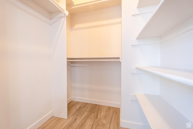 10227 S Oquirrh Lake Rd, South Jordan, UT 84095 - spacious closet featuring light wood finished floors