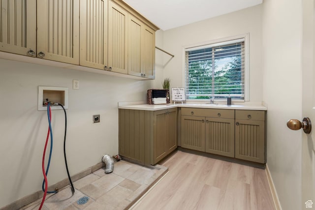 584 S Silver Ln, Alpine, UT 84004 - laundry room with electric dryer hookup, cabinet space, hookup for a washing machine, light wood finished floors, and baseboards