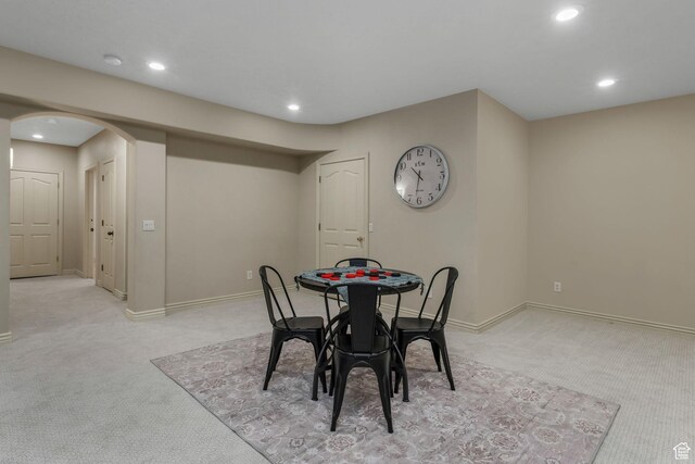 584 S Silver Ln, Alpine, UT 84004 - dining space with light carpet, arched walkways, recessed lighting, and baseboards