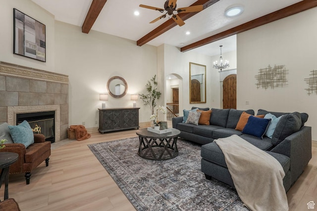 584 S Silver Ln, Alpine, UT 84004 - living room featuring arched walkways, a ceiling fan, light wood finished floors, beam ceiling, and recessed lighting