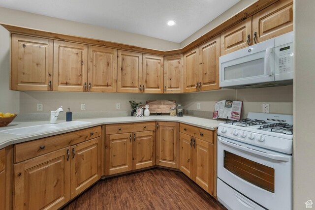 584 S Silver Ln, Alpine, UT 84004 - kitchen with white appliances, dark wood-style flooring, light countertops, a sink, and recessed lighting