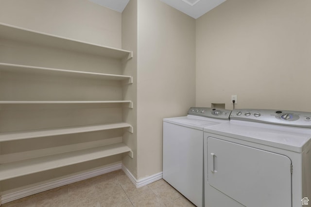 584 S Silver Ln, Alpine, UT 84004 - washroom with washing machine and dryer, light tile patterned floors, and baseboards