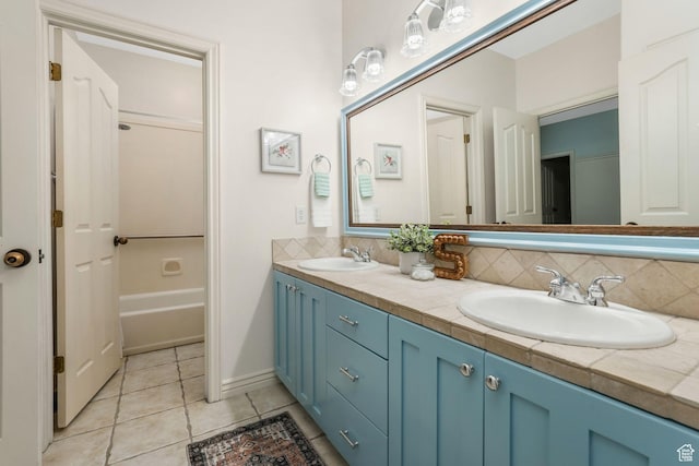 584 S Silver Ln, Alpine, UT 84004 - bathroom featuring double vanity, backsplash, tile patterned flooring, and shower / washtub combination