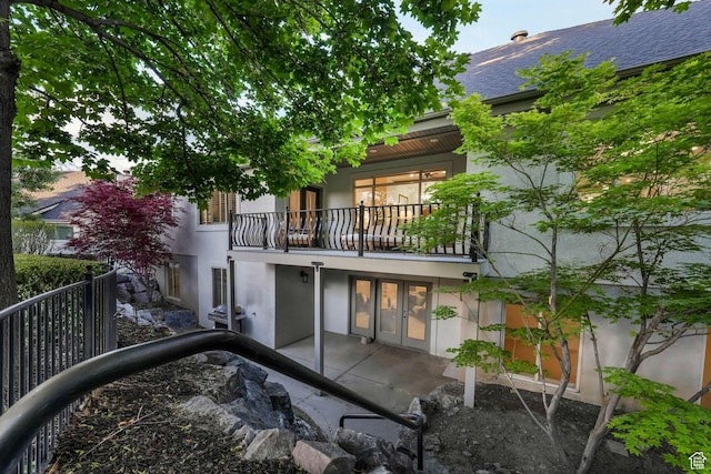 584 S Silver Ln, Alpine, UT 84004 - rear view of house with a balcony, french doors, stucco siding, and a patio
